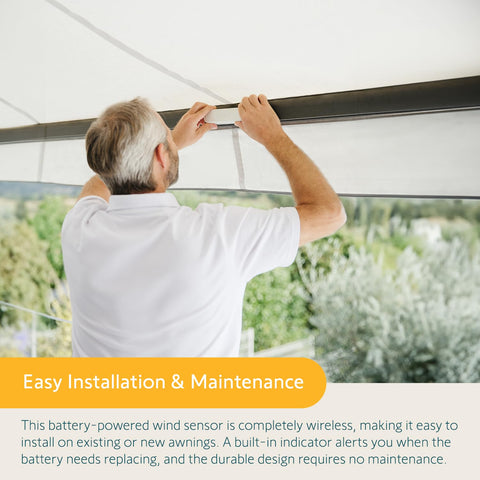 Person installing Eolis 3D WireFree RTS Wind Sensor For Awnings, Wireless Auto Retraction, Off White Finish