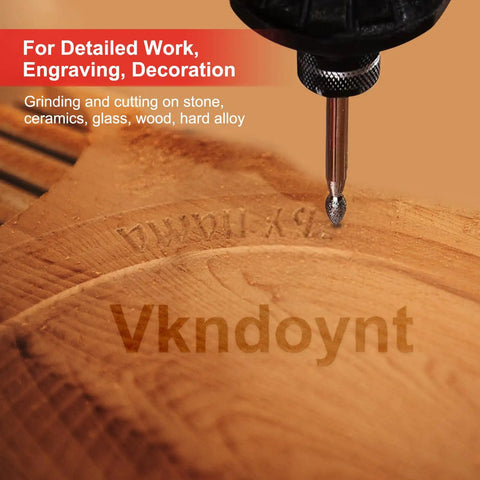 Detailed work using Badass 544 Piece Rotary Tool Accessories Kit With Universal Drill Bits Sanding Discs on wood.