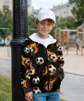 Boy wearing Boys Flame Soccer Print Full Zip Hoodie for winter running and morning recess, standing outdoors.