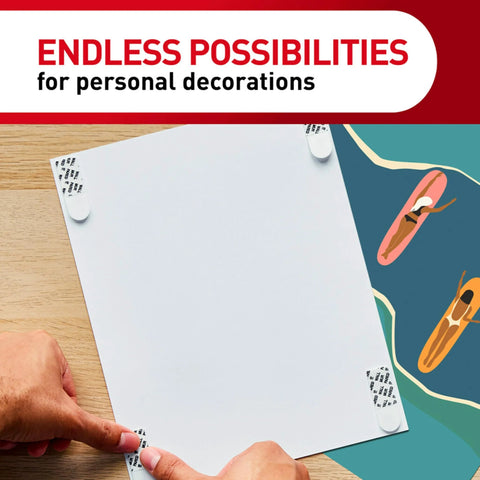Applying Poster Strips 64 Count Damage Free Hanging Adhesive to white board on wood table, ideal for Christmas decorations