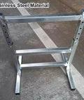Heavy Duty Stainless Steel Gravity Conveyor Rollers With Adjustable Height Stand For Industrial Factories And Warehouses Rustproof And Waterproof stand showcasing stainless steel material.