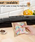 Heat sealer being used to seal a bag of marshmallows on a kitchen counter with olive oil and spices in the background.
