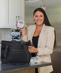 Powerhouse Rechargeable Cordless Breast Pump With Hospital Strength Suction And Dual Adjustable Settings shown in a stylish tote bag.