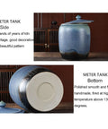 Slick Ceramic Food Storage Jar Gradient Blue Rice Cylinder High Temperature Fired Pantry Bin For Coffee Beans Snacks And Grains from the side showing decorative pattern and lid.