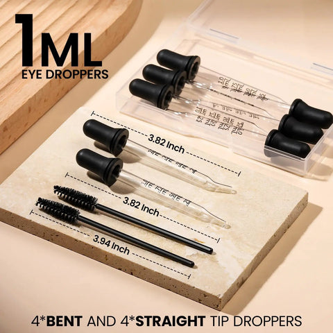 Glass Dropper Set With 10 Pieces Featuring 8 1ml Droppers And 2 Cleaning Tools, visible droppers and cleaning brushes on a board