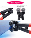 Must Have Complete Glass Cutting Tool Set Kit With 8 Inch Tile Nippers cutting blue glass sheet, with red handles, close-up view