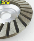 Close-up of a 4 Inch Diamond Grinding Cup Wheel For Granite Marble Concrete Brick Low Noise Aluminum Based Turbo Cup Disc
