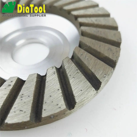 Close-up of a 4 Inch Diamond Grinding Cup Wheel For Granite Marble Concrete Brick Low Noise Aluminum Based Turbo Cup Disc