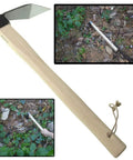 Carbon Steel Hand Mattock Pick for Gardening and Farming, heavy-duty forged blade with angled edge shown in use breaking soil