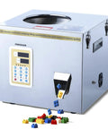 Digital Counting Filling Machine For Buttons And Small Toys. Food Grade 304 Stainless Steel Counter with optical sensor and colorful building blocks.