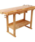 Built Tough 48 Inch Adjustable Standing Desk For Gaming Or Home Office Heavy Lifter 330 Lb Capacity Smooth Lift Computer Table With Plenty Of Workspace Prime Gear Setup in natural wood finish with a sturdy frame.