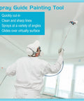 Man using Universal 7 Piece Paint Sprayer Airless Spray Guide Accessory Kit with 30 Inch Extension Pole for ceiling painting.