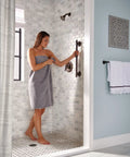 Person using Oil Rubbed Bronze 24 Inch Stainless Steel Bathroom Grab Bar For Safety And Stability Traditional Style Easy Install
