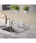 Modern kitchen with Colony Pro Single Handle Kitchen Faucet With Deck Plate In Polished Chrome beside stainless steel sink