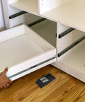 Cabinet drawer with Two Pack Rubber Toggle Latch Draw Catch for storage boxes and boat cargo placed on wooden floor.