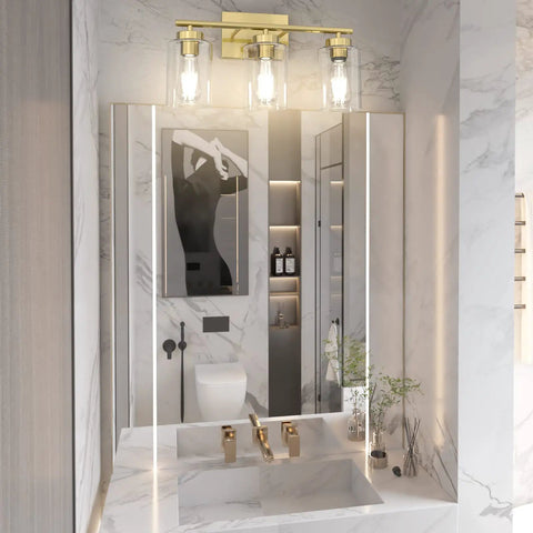 Brushed Brass Modern Bathroom Light Fixtures With Clear Glass Shade Three Light Vanity Wall Sconce above bathroom mirror