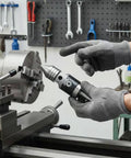 Heavy Duty Taper Pin Lathe Center With Rotating Conical Point For Woodturning Projects, 12mm alloy steel tool in use.