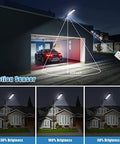 All Season Sun Powered Stunner Solar Outdoor Wall Floodlights With Smart Motion Sensor And Wireless Remote illuminating driveway and house.