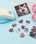 1 Inch Puzzle Hole Puncher For DIY Jigsaw Crafts Portable Cardboard Cutter with puzzle pieces and photo, tool on blue surface