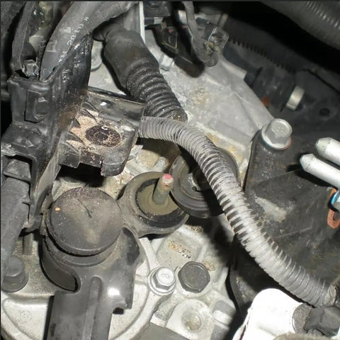 Close-up of Hyundai Elantra 2011-2016 and Sonata 2007-2012 gear shift linkage bushings repair kit installed in vehicle