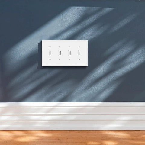 Modern Edge Quad Toggle Wall Plate White For Switches And Outlets Durable Zinc Alloy Decor Cover Heavy Duty Easy Install 8.6 Inch Long By 4.9 Inch Wide installed on a blue wall
