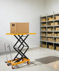 Rock Solid Double Scissor Hydraulic Lift Table Cart 770 Lbs Capacity 51 Inch Lift Height with box on top in warehouse.