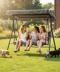 Three Person Outdoor Porch Swing Chair With Adjustable Canopy Breathable Fabric Seat And Backrest Armrests Heavy Duty Frame 600 Lbs Capacity For Patio Backyard Or Garden Gray Ideal For Chill Sessions And Social Evenings with people enjoying in garden