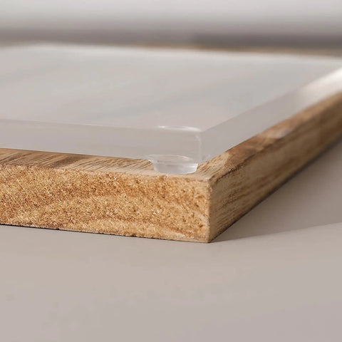 Clear Self Adhesive Cabinet Bumpers Shield Furniture From Harsh Door Slams And Cut Down Household Noise Soft Silicone Rubber Pads seen on a wooden surface.