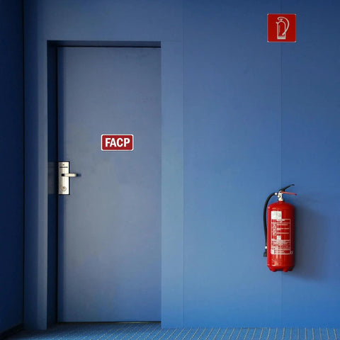 Fire alarm control panel sign and extinguisher on blue wall, showing placement for Two Pack Fire Alarm Control Panel Signs With Nails.