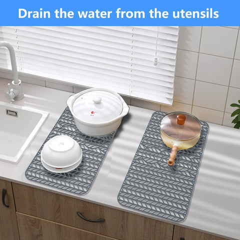 Silicone Sink Mat Grid Protector For Kitchen Sinks 12 To 29.5 Inches DIY Cut To Fit Bottom Of Sink Shield For Stainless Steel Farmhouse Sinks Durable Non Slip Mat on counter with cookware