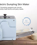 Game Changing Electric Automatic Dumpling Wrapper Maker With 8Cm Round Mold And Rock Solid 140W Motor cranking out 60 skins per minute.