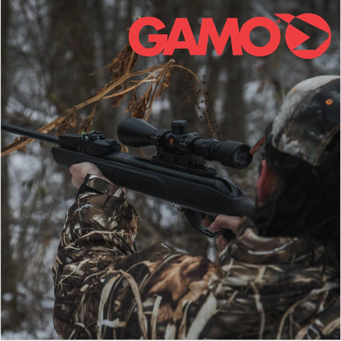 Person aiming Dual Mode Break Barrel Air Rifle With Semi Auto And Full Auto Fire 1300 FPS .22 Caliber in outdoor setting