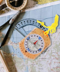 Orienteering Compass With Luminous Pointer For High Precision Hiking on a map, showcasing its compact, lightweight acrylic design