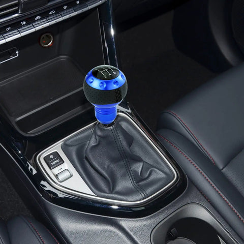 Bold Blue Five Speed Ball Shift Knob With Crisp Gear Map For Manual Transmissions, 4 inch aluminum, in a car interior.