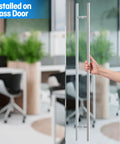 60 Inch Push Pull Door Handle Made From 304 Stainless Steel With Polished Chrome Finish, installed on glass door