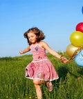 Girl in pink dress with 13 Piece Hot Air Balloon Iron On Patches Set With Colorful Embroidered Appliques For Clothes