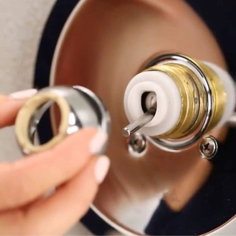 Close-up of the 11 Piece Delta Faucet Repair Kit With 212 SS Ball for Leak Free Single Handle Faucets installation process.