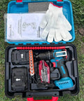 Boss Level 21V Cordless Drill Set With Dual Speed Mode, 10mm Quick Change Chuck, 2 Batteries, And 24 Piece Accessory Kit laying in a carrying case with gloves.