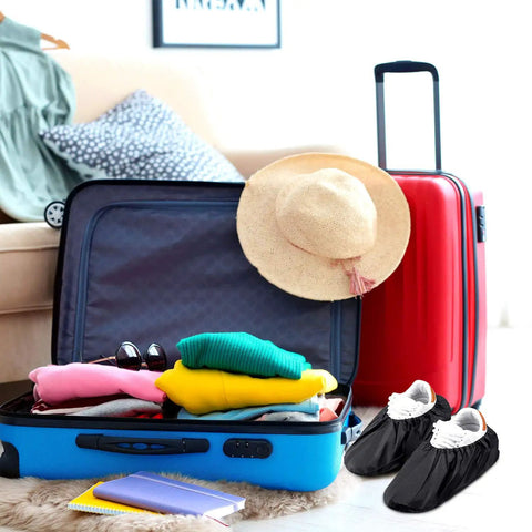 8 Pairs Non Slip Reusable Shoe Covers Waterproof Boot Covers With Elastic Band near suitcase and travel items.
