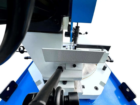 Heavy Duty 16 Inch Cold Cut Saw Built Like A Tank With Killer 4Hp Motor 220 Volt Three Phase Cuts Steel Aluminum Smooth Swivel Miter Sixty Degrees Double Vise Clamp Included close-up view of the cutting area.