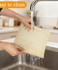 Cleaning a Bamboo Sushi Rolling Mat Set Of 4 Pcs For Homemade Maki Kimbap And Rolls Natural Wood Mats under running water