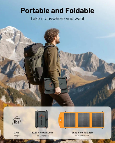 Man hiking in mountains holding 30W Portable Foldable Solar Panel Charger With USB A and USB C Fast Charging, compact and lightweight.