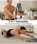 Upgrade Your Home Gym With This Badass 3 In 1 Twister Arm Trainer; man using hydraulic arm trainer and ab wheel in home setting.