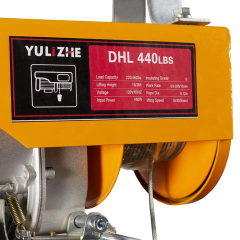 Close-up of Yellow Heavy Duty 440 Lb Electric Hoist And Winch Kit With Remote Control 120V Lift System, showing label and steel cable.