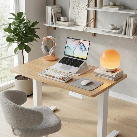 Compact 32 Inch Electric Standing Desk With Four Memory Height Settings For Home Office And Computer Workstation In Light Walnut Finish
