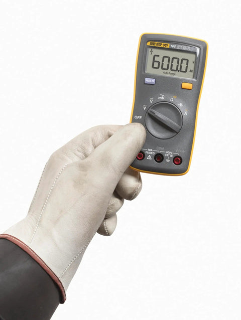 Person holding Palm Sized Digital Multimeter For On The Go Tech Work Measures Voltage Resistance Continuity And Capacitance With 10A Current