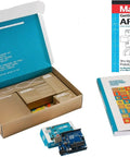 Top Shelf Electronics Learning Kit For Absolute Beginners With Straight Up Step By Step Guides featuring Arduino Uno board and project books.