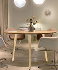 Premium Solid Wood Table Legs 28 Inches Tall Natural Finish Heavy Duty Dining Desk Supports Slanted Base For Rock Solid Stability and Quick Install Project Pieces Built Tough American Design in dining room setting.