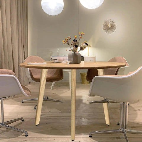 Premium Solid Wood Table Legs 28 Inches Tall Natural Finish Heavy Duty Dining Desk Supports Slanted Base For Rock Solid Stability and Quick Install Project Pieces Built Tough American Design in dining room setting.