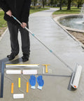 Person using Self Leveling Epoxy Floor Kit For DIY And Commercial Refinishing With 20 Inch And 9 Inch Defoaming Rollers outdoors